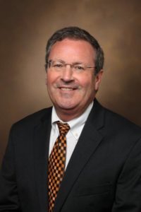 A head-and-shoulders professional photo of Rick W. Wright, MD.